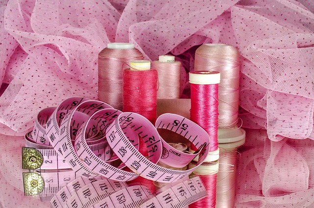 calm sewing table with fabric swatches measuring tape and scissors