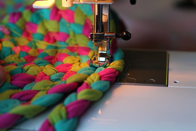 sewing workspace with machine scissors thread neutral tones