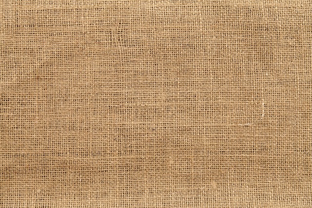 handmade cushions on sofa neutral fabric piping seams detail